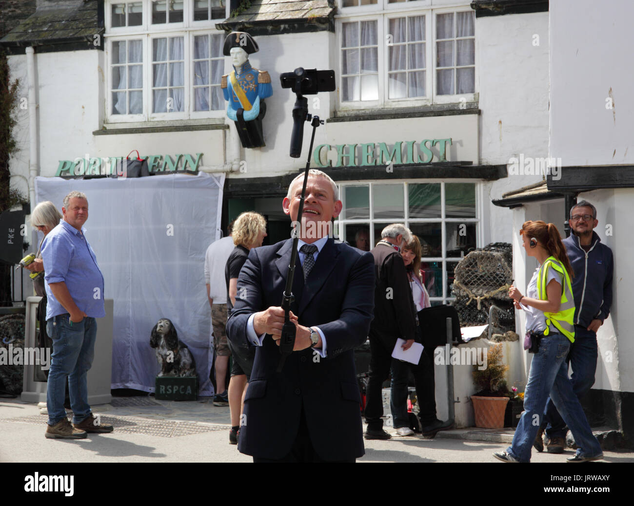 Martin Clunes on location filming Doc Martin, taking time out from