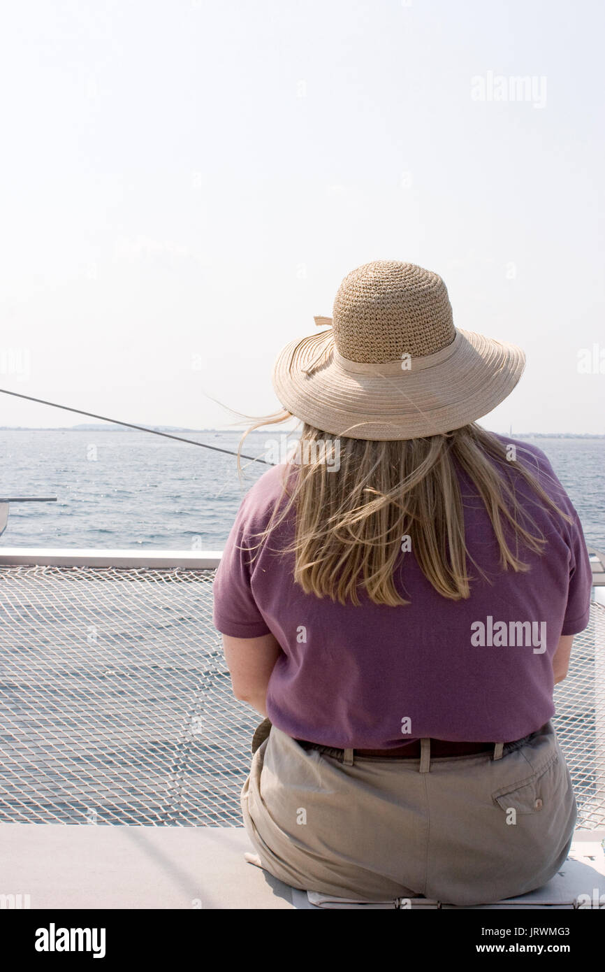 Woman sitting in a boat looking at a view hi-res stock photography and ...