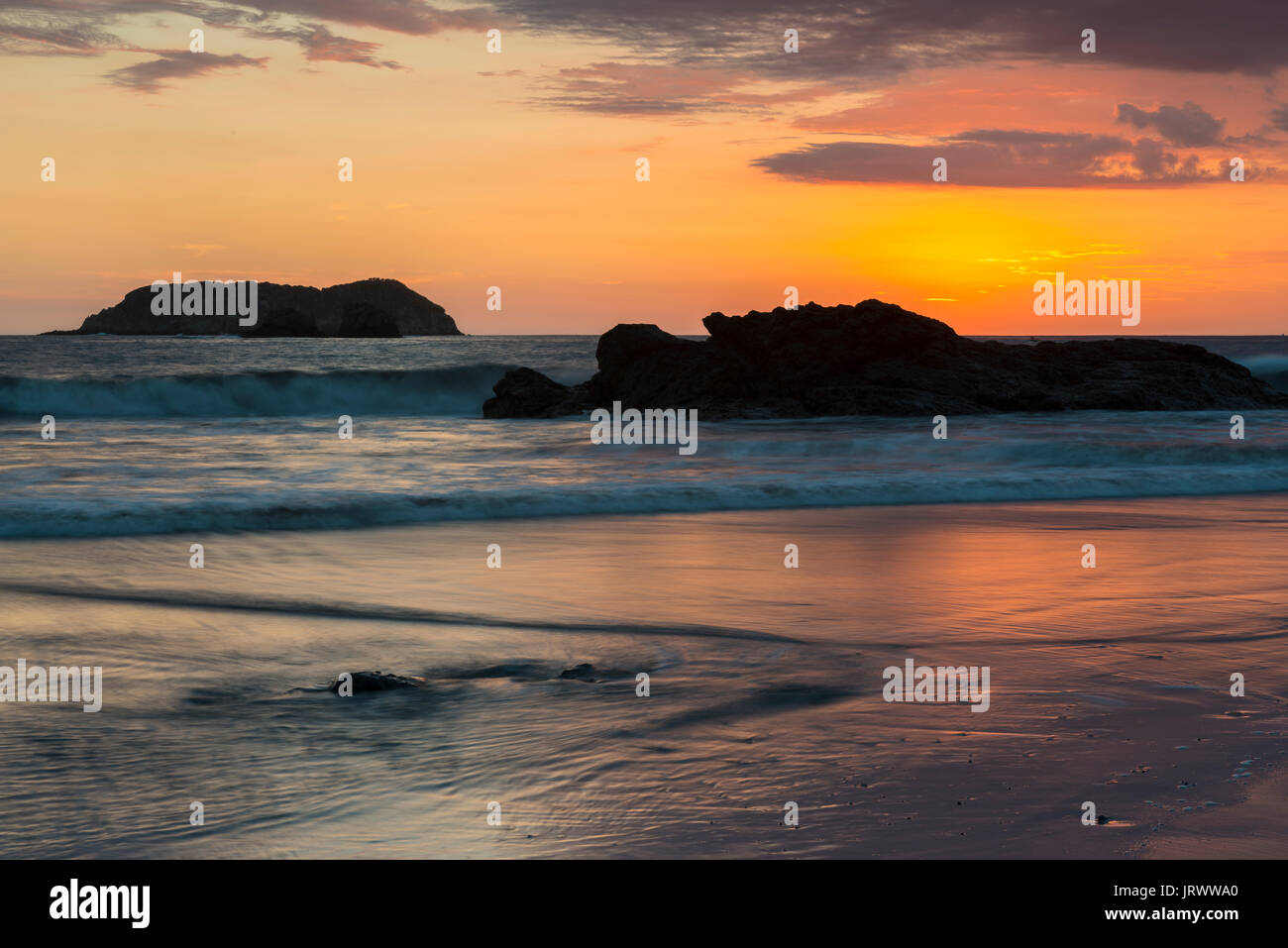 Sunset at Playa Espadilla, Manuel Antonio National Park, Costa Rica Stock Photo