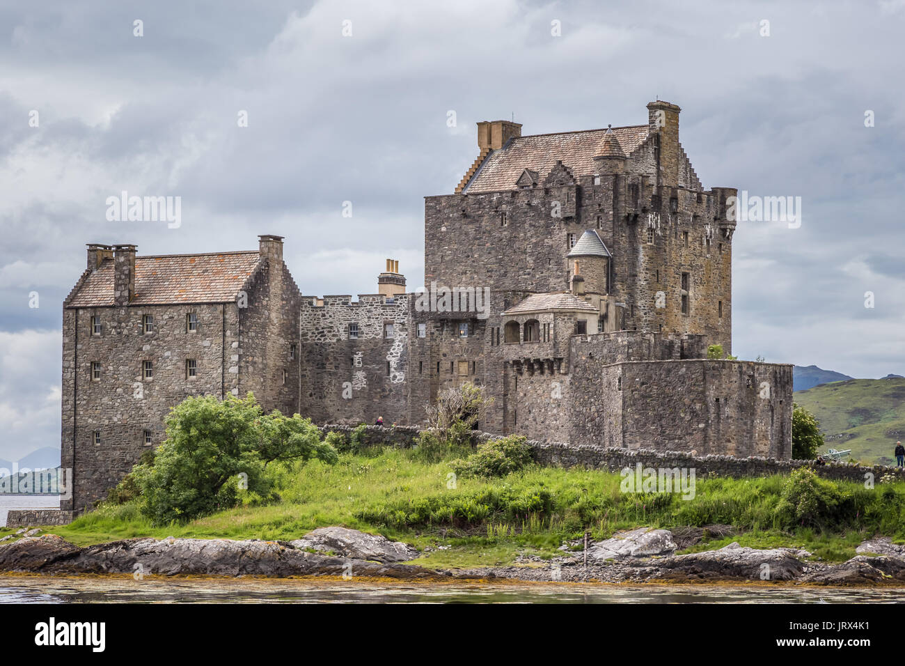 Eilean Donan Castle stands on a small tidal island where three sea lochs meet - Loch Duich, Loch Long and Loch Alsh. Stock Photo