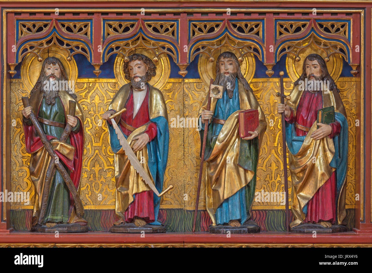 BERLIN, GERMANY, FEBRUARY - 16, 2017: The carved statue of apostles Andrew, Simon, Jude Thaddheus and James the Great in church of St. Pauls by unknow Stock Photo