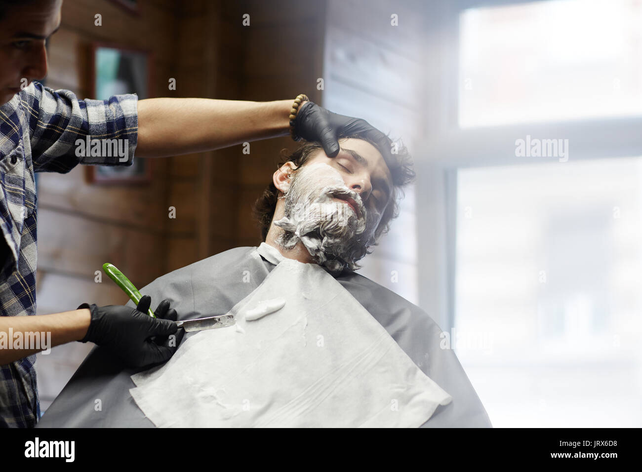 Client of barber Stock Photo