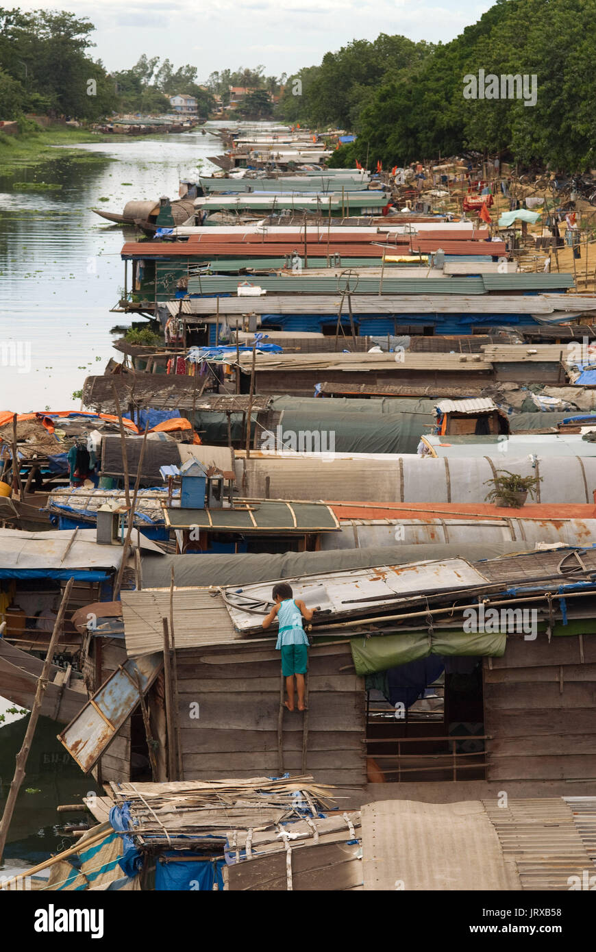 Poor Hué people live in Sampans settlements located on the shores of a Canal leading to the Perfume river Vietnam Stock Photo