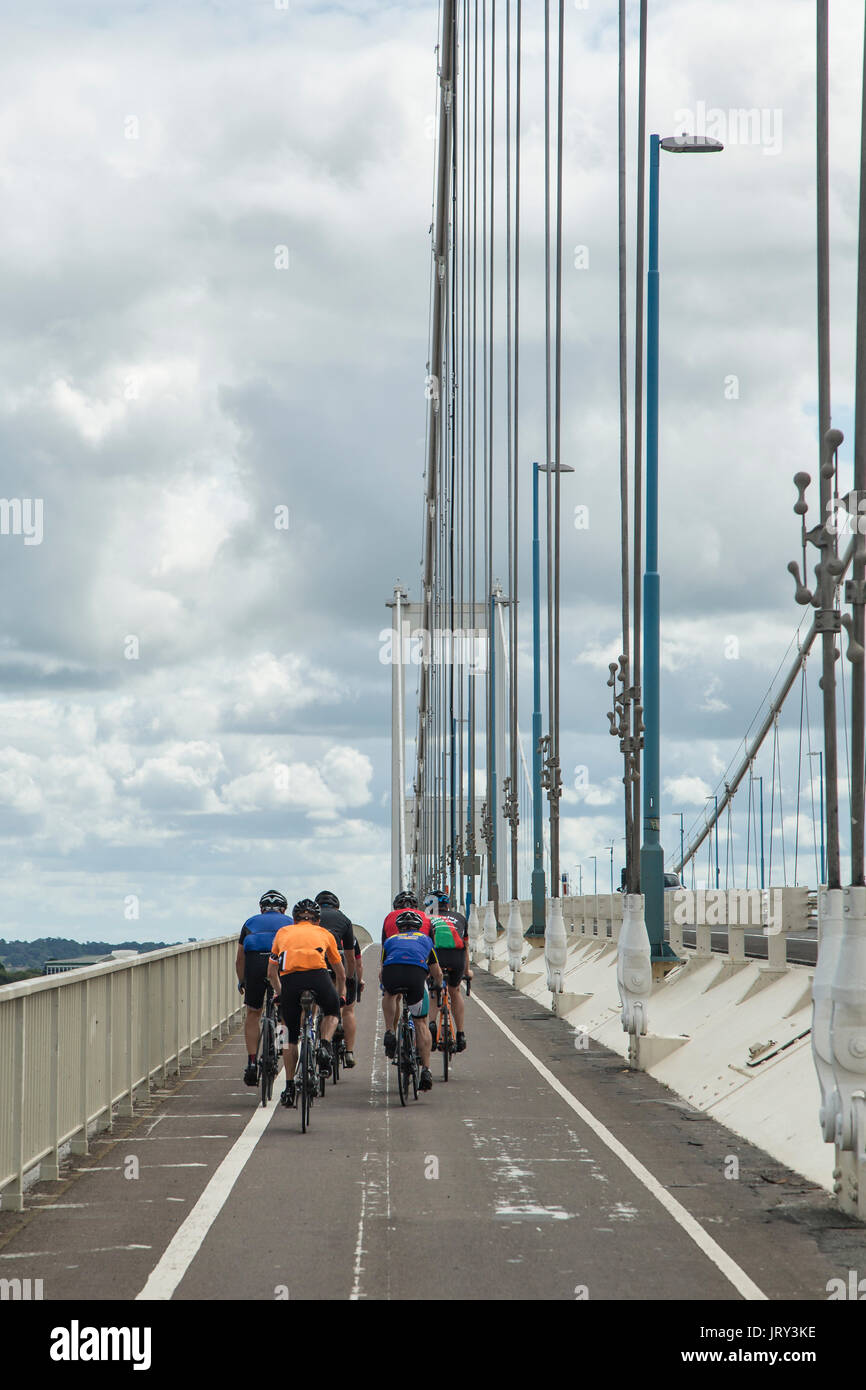 Cyclists on the cycle and foot path along the Severn Bridge (M48) Stock Photo