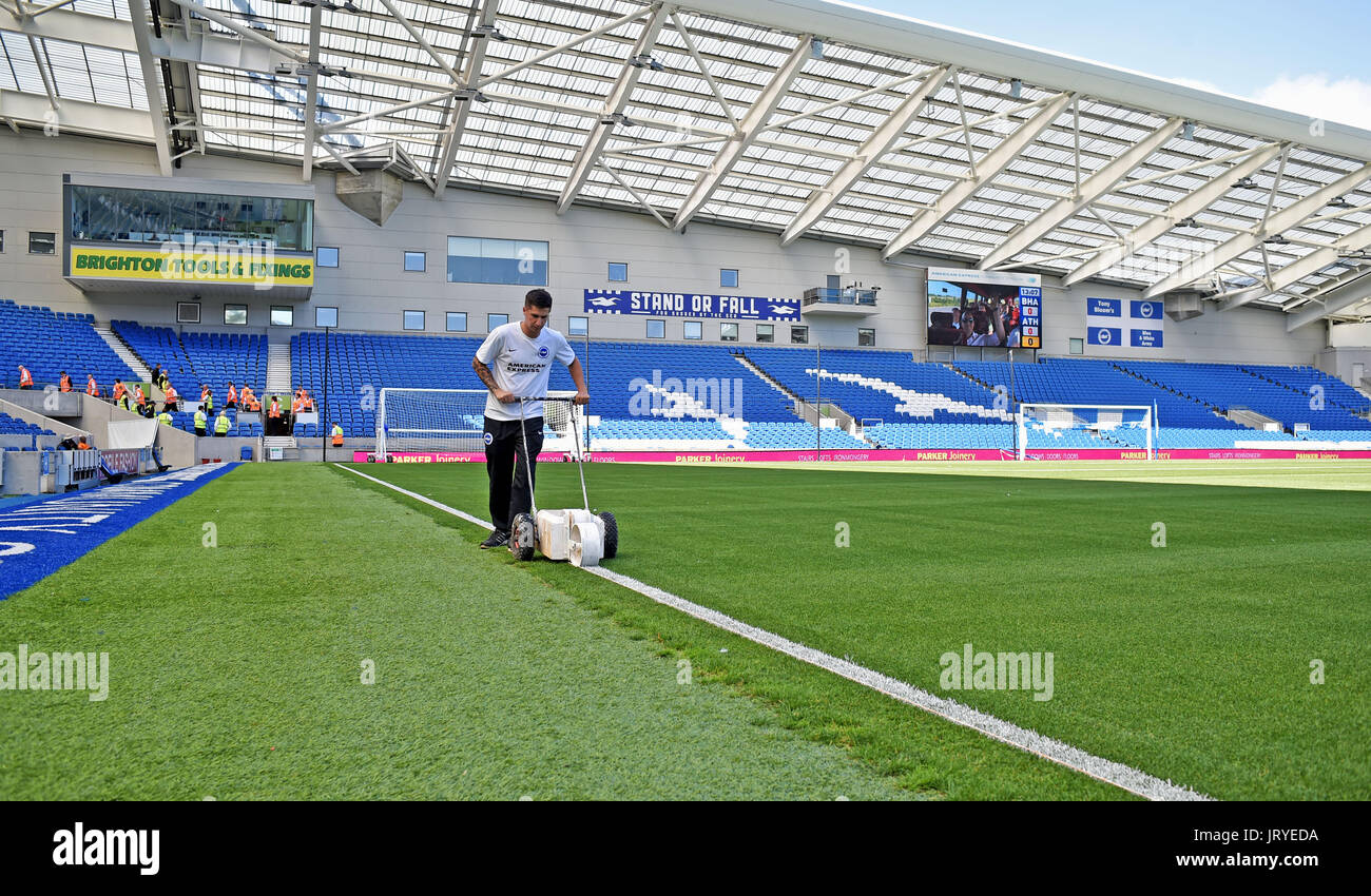 Ground staff prepare the stadium for the Friendly match between Brighton and Hove Albion and Atletico Madrid at the American Express Community Stadium in Brighton and Hove. 06 Aug 2017 Stock Photo
