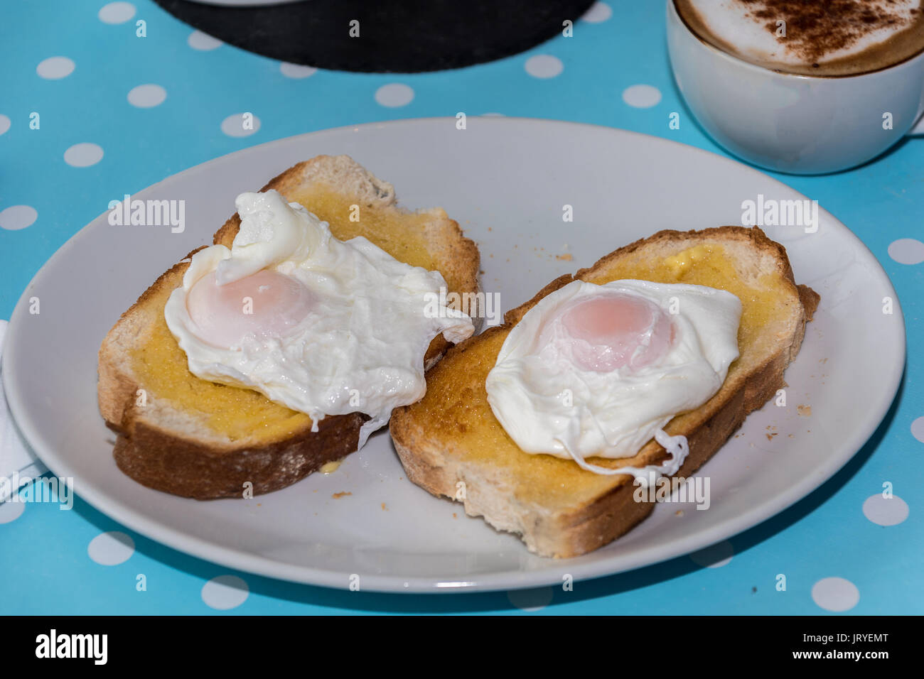 Two poached eggs on toast Stock Photo