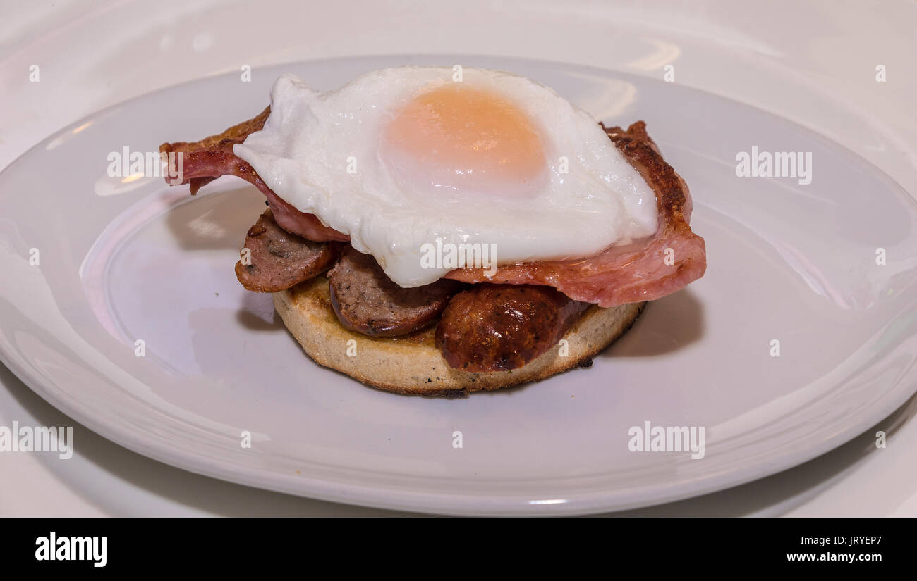 Sausage egg and bacon on a muffin Stock Photo Alamy