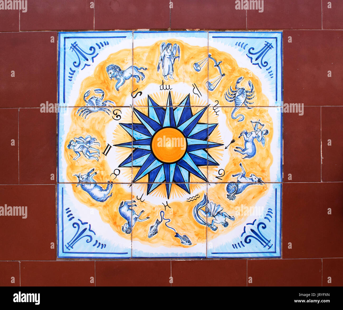 an italian tiled floor with a zodiac symbols centre tile Stock Photo