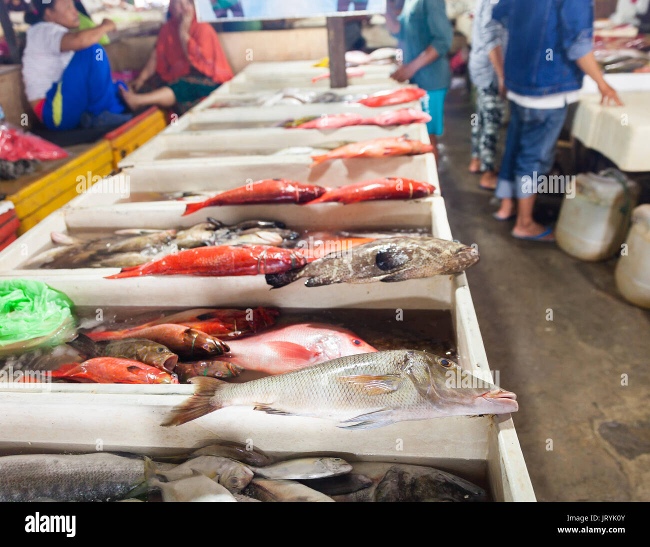 Selling fresh seafood fish on the tourist attraction local market in