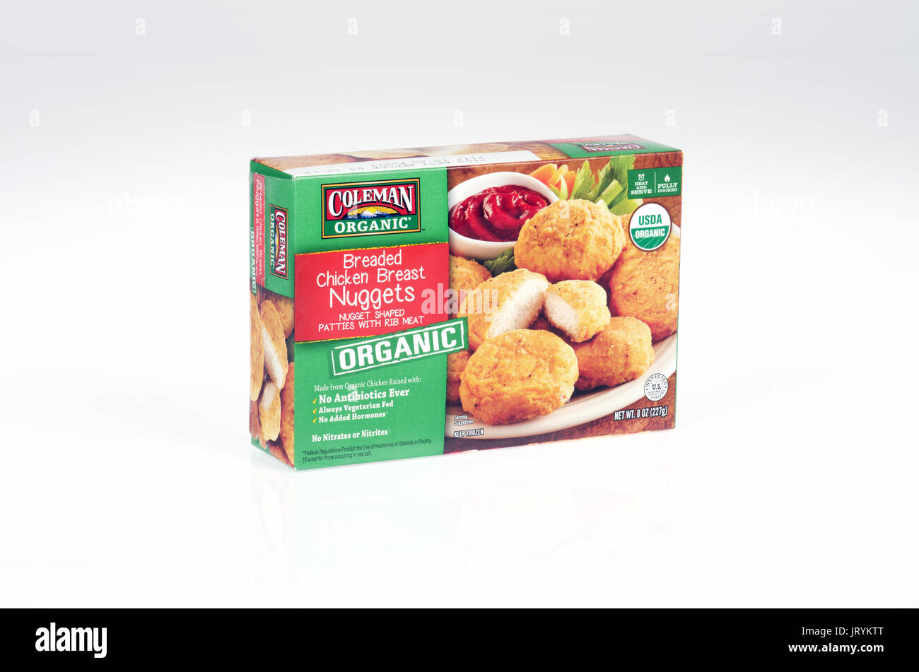 Unopened box of  Coleman Organic frozen chicken nuggets on white background, USA. Stock Photo