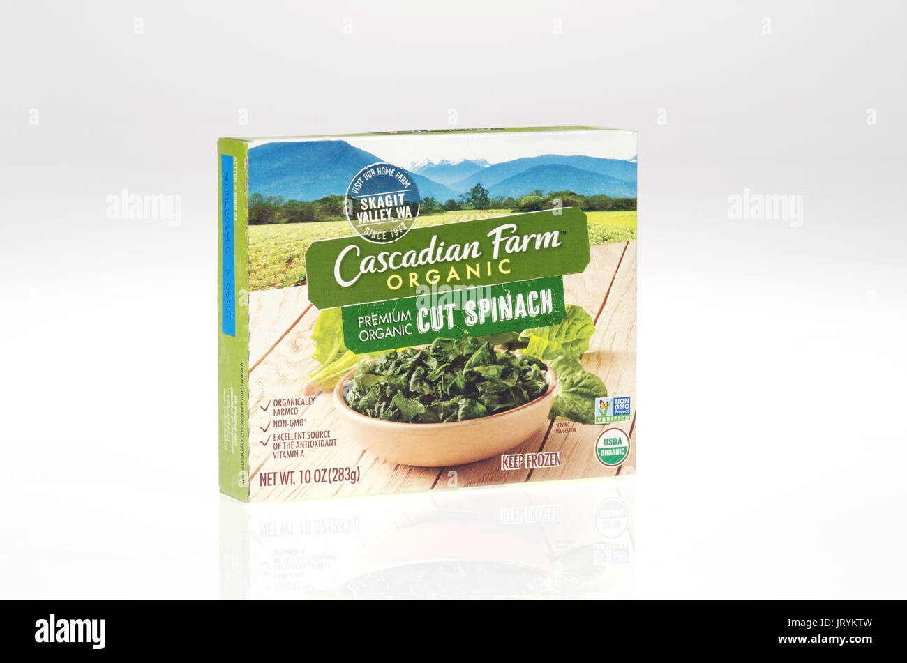 Box of unopened Cascadian Farms Organic Frozen Cut Spinach on white background. USA Stock Photo