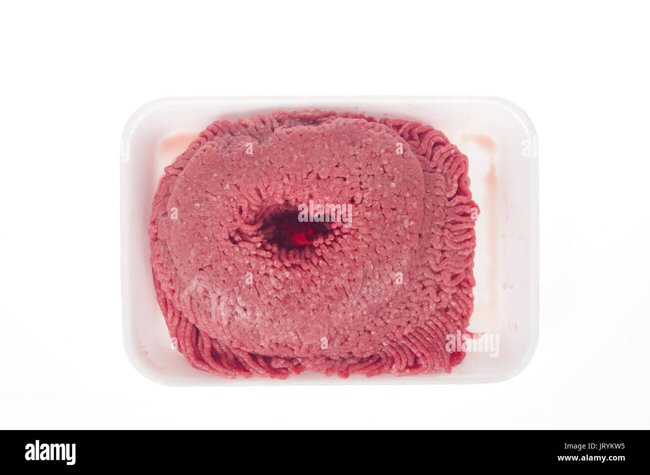 A package of 93% lean raw ground beef in styrofoam container on white background. Stock Photo