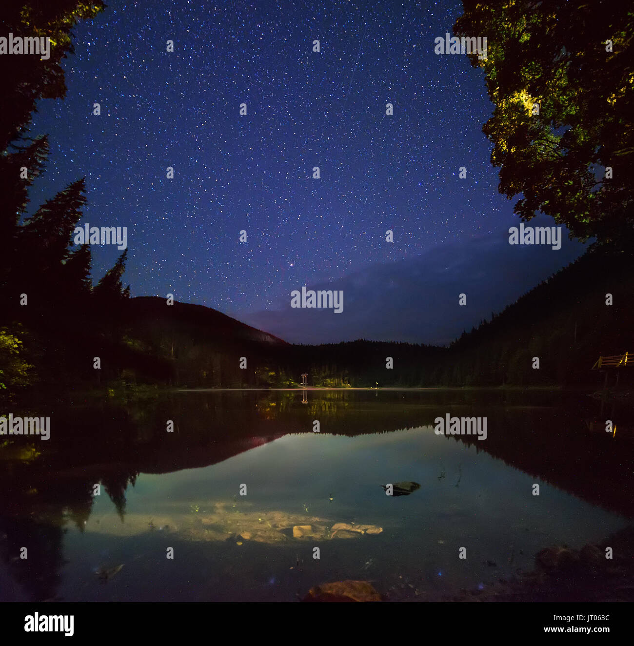 Mountain lake at night Stock Photo - Alamy