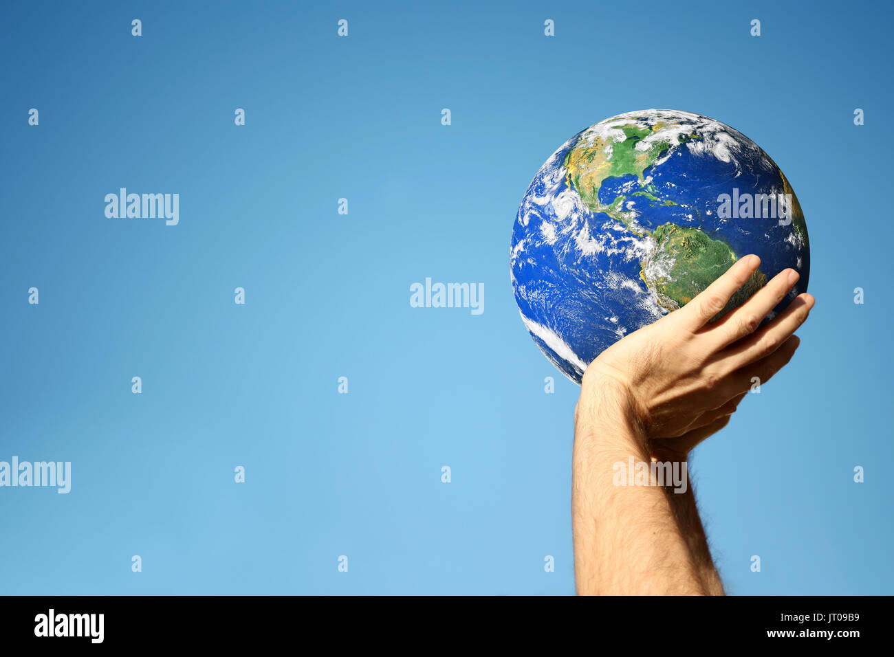 Hand holding world globe hands hi-res stock photography and images - Alamy