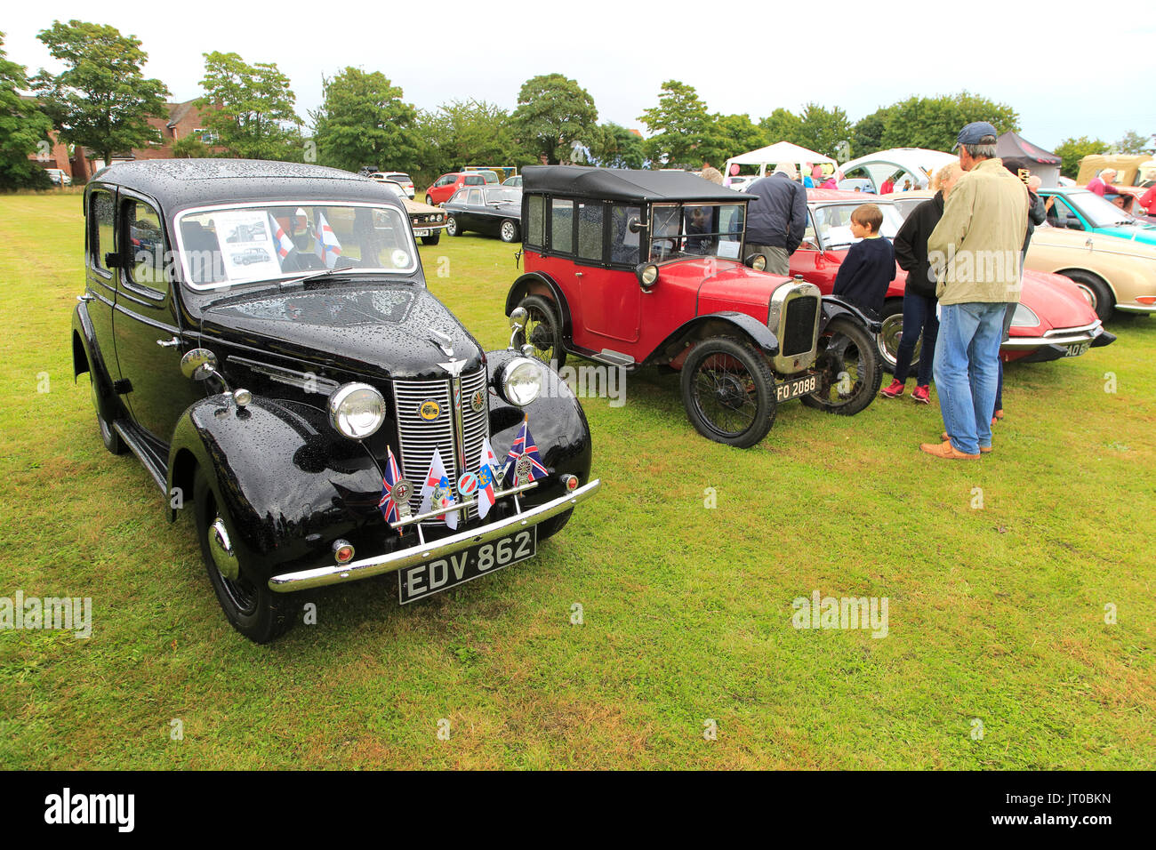 Historic classic vintage vehicles at summer fete car rally, Alderton, Suffolk, England, UK Stock Photo