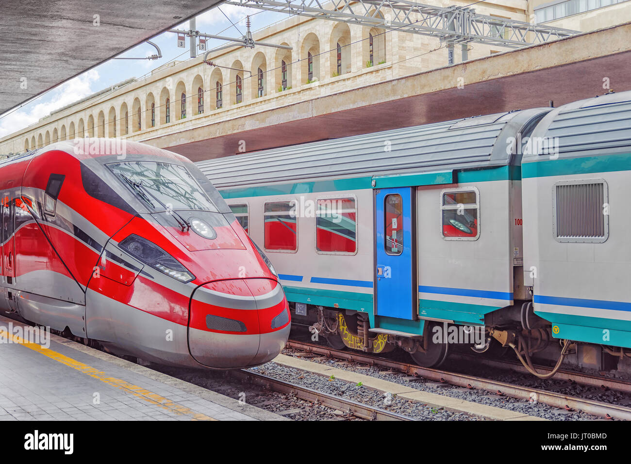 Modern highspeed passenger train stand on the railways station Stock
