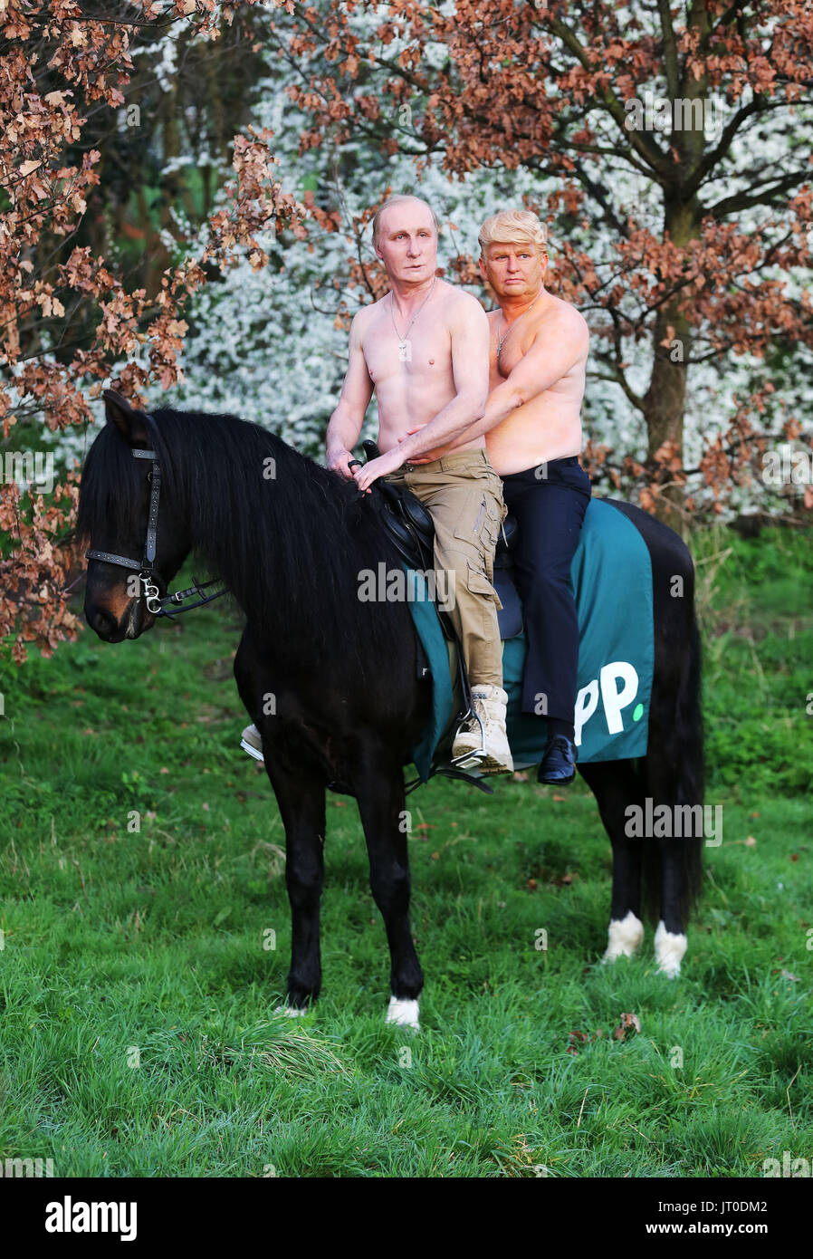 Actors in prosthetic make-up portraying Presidents Vladimir Putin and ...