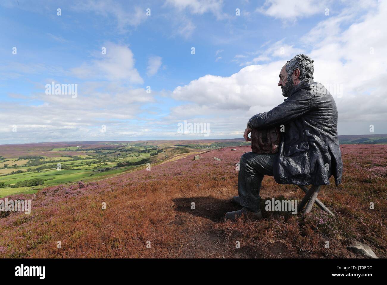 The Seated Man, a 3 meter sculpture by Sean Henry, at Castleton Rigg, near Westerdale in the North York Moors National Park. Stock Photo