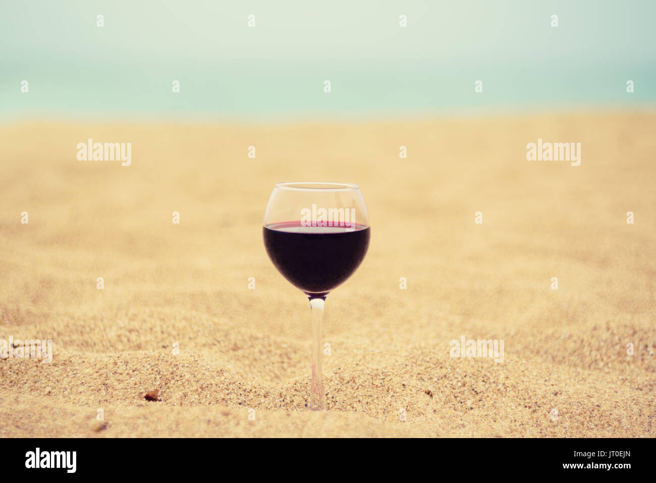 Wine on the sand Stock Photo - Alamy