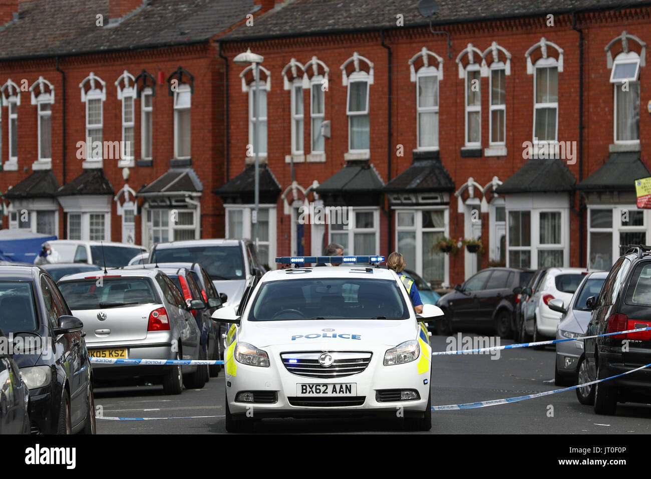 Police and forensics on Tenby Road in Moseley, Birmingham, where a 40-year-old man has been stabbed to death in what police are calling a 'brutal attack'. Stock Photo