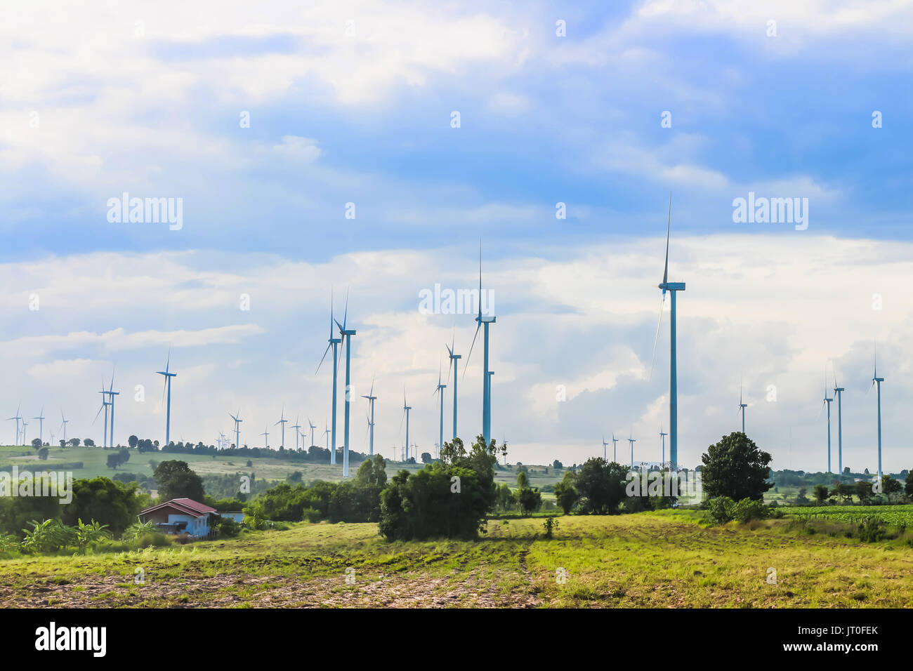 wind mill turbine with blue sky landscape Stock Photo - Alamy