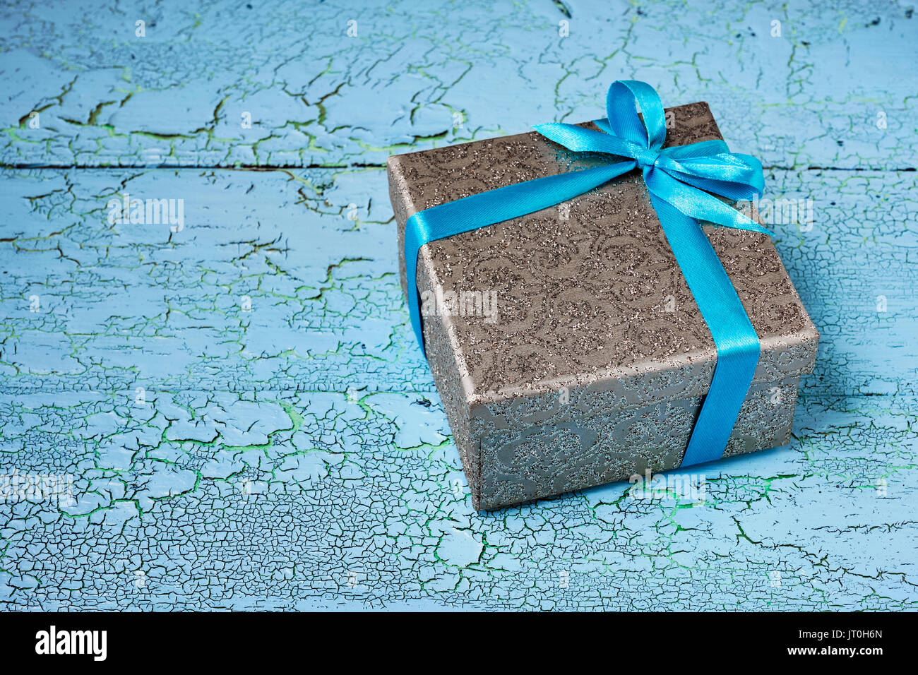 Gift box with blue ribbon Stock Photo