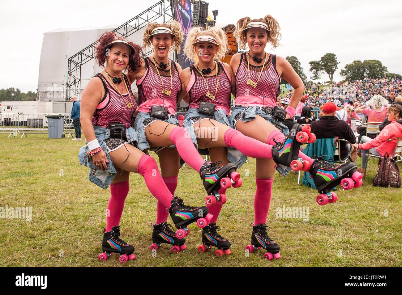 Festival goers in Roller Disco fancy dress at Rewind North Festival, Capesthorne Hall, Cheshire