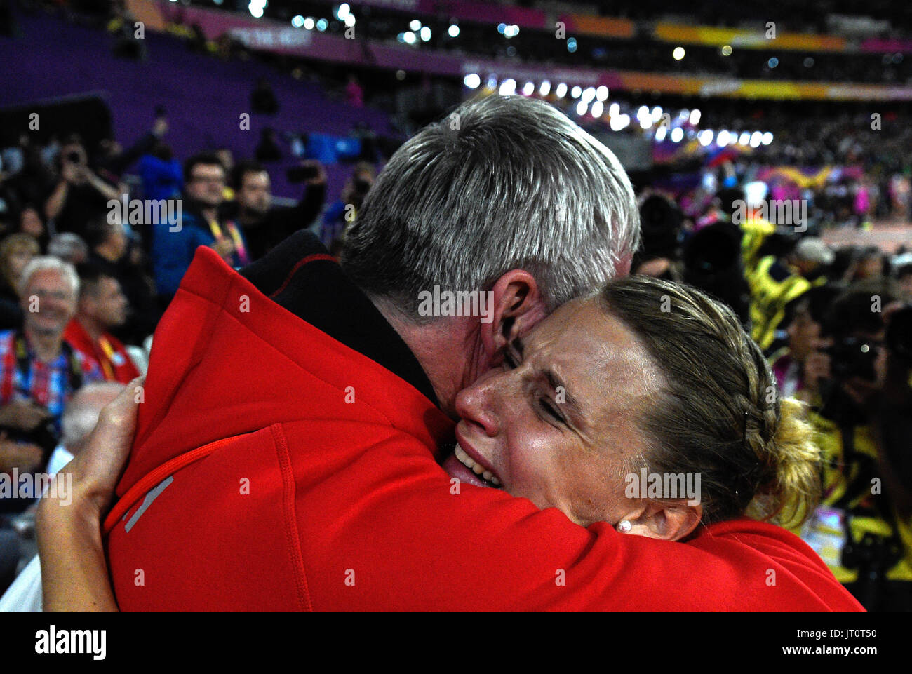 London, UK. 6th Aug, 2017. Carolin Schaefer of Germany celebrates her silver medal in the overall ranking together with her coach Juergen Sammert after the women's 800 metre track of the hepathlon at the IAAF World Championships in Athletics at the Olympic Stadium in London, UK, 6 August 2017. Photo: Rainer Jensen/dpa/Alamy Live News Stock Photo