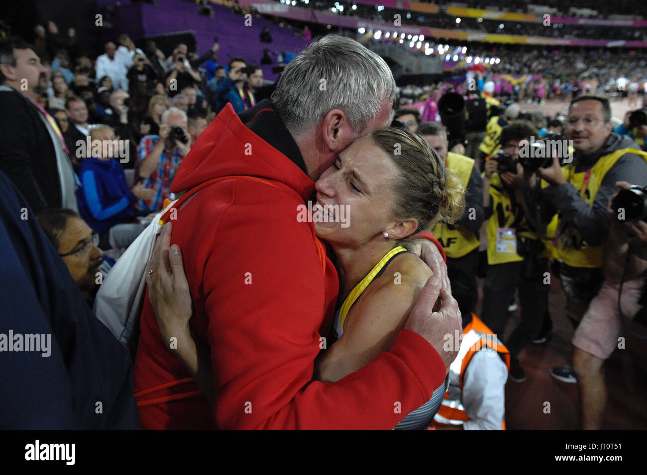 London, UK. 6th Aug, 2017. Carolin Schaefer of Germany celebrates her silver medal in the overall ranking together with her coach Juergen Sammert after the women's 800 metre track of the hepathlon at the IAAF World Championships in Athletics at the Olympic Stadium in London, UK, 6 August 2017. Photo: Rainer Jensen/dpa/Alamy Live News Stock Photo