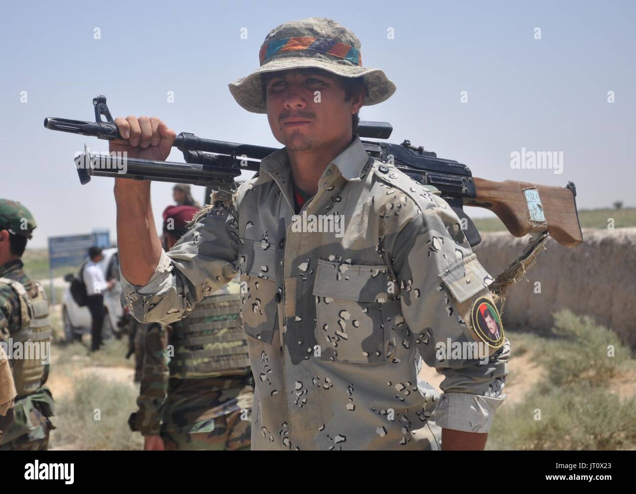 Shiberghan, Afghanistan. 6th Aug, 2017. A member of Afghan security forces takes part in a military operation in Aqcha district of Jawzjan province, Afghanistan, Aug. 6, 2017. As many as 12 militants have been killed in separate incidents in two northern Afghan provinces, officials said on Sunday. Fighting has escalated as the Taliban insurgency spread from its traditional strongholds in southern and eastern Afghanistan to the once peaceful northern region, where Taliban have been recruiting from the youths. Credit: Mohammad Jan Aria/Xinhua/Alamy Live News Stock Photo