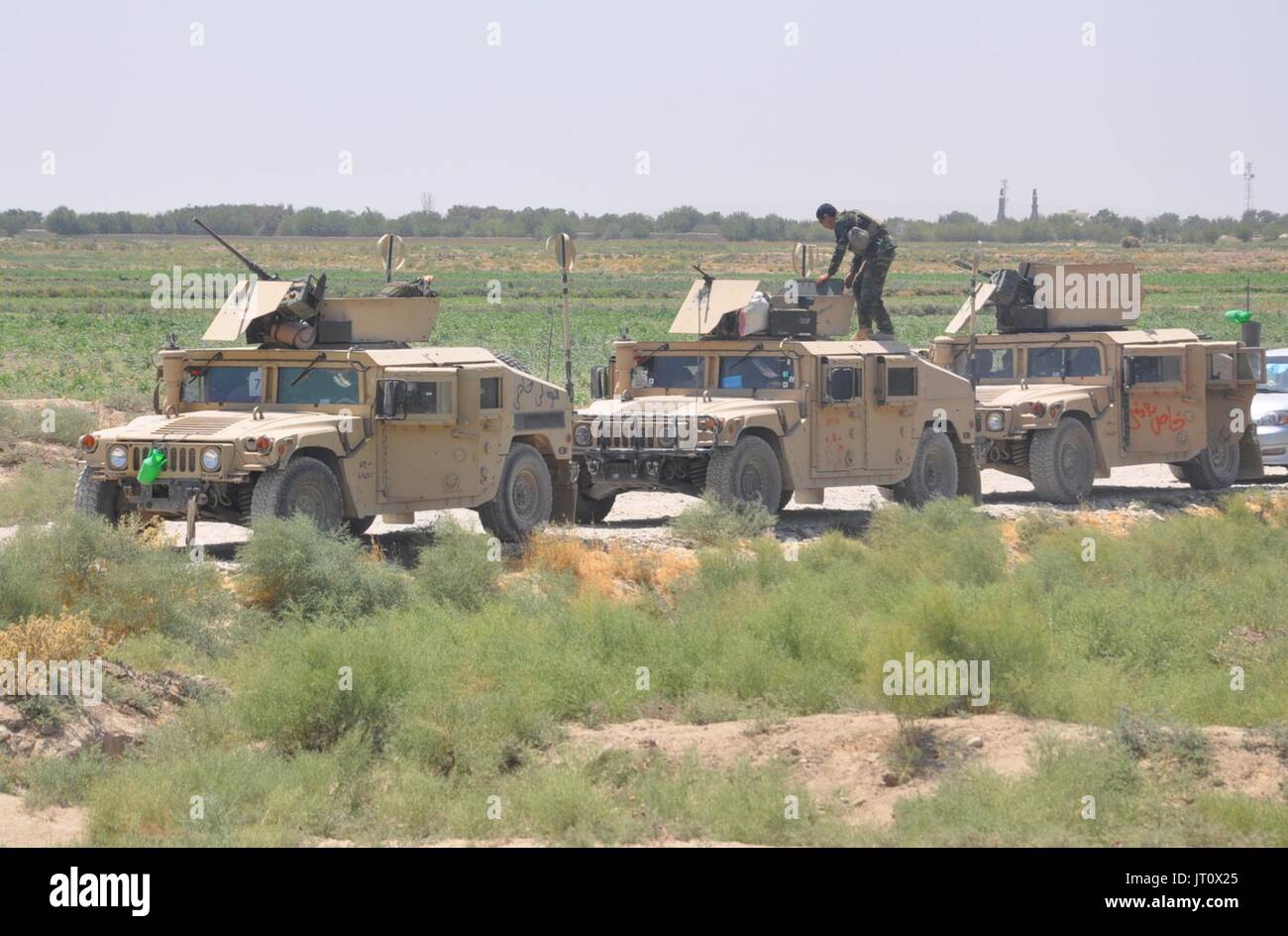 Shiberghan, Afghanistan. 6th Aug, 2017. Photo taken on Aug. 6, 2017 shows Afghan military vehicles during a military operation in Aqcha district of Jawzjan province, Afghanistan, Aug. 6, 2017. As many as 12 militants have been killed in separate incidents in two northern Afghan provinces, officials said on Sunday. Fighting has escalated as the Taliban insurgency spread from its traditional strongholds in southern and eastern Afghanistan to the once peaceful northern region, where Taliban have been recruiting from the youths. Credit: Mohammad Jan Aria/Xinhua/Alamy Live News Stock Photo