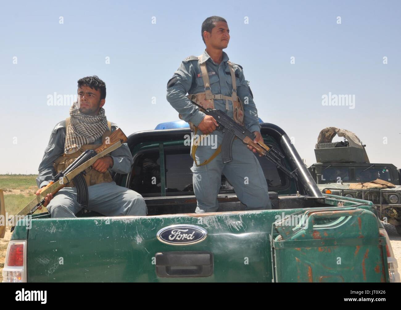 Shiberghan, Afghanistan. 6th Aug, 2017. Members of Afghan security forces take part in a military operation in Aqcha district of Jawzjan province, Afghanistan, Aug. 6, 2017. As many as 12 militants have been killed in separate incidents in two northern Afghan provinces, officials said on Sunday. Fighting has escalated as the Taliban insurgency spread from its traditional strongholds in southern and eastern Afghanistan to the once peaceful northern region, where Taliban have been recruiting from the youths. Credit: Mohammad Jan Aria/Xinhua/Alamy Live News Stock Photo