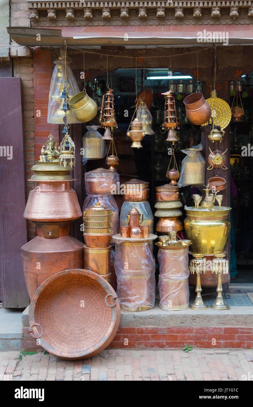 Outdoor display of brassware at a store in Bhaktapur, Nepal. Stock Photo