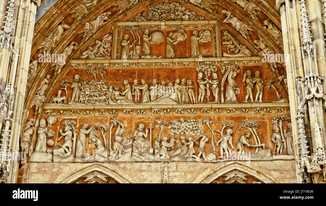 Figures from Genesis above the main portal of Ulmer Münster or Ulm Minster in Ulm, Germany Stock Photo