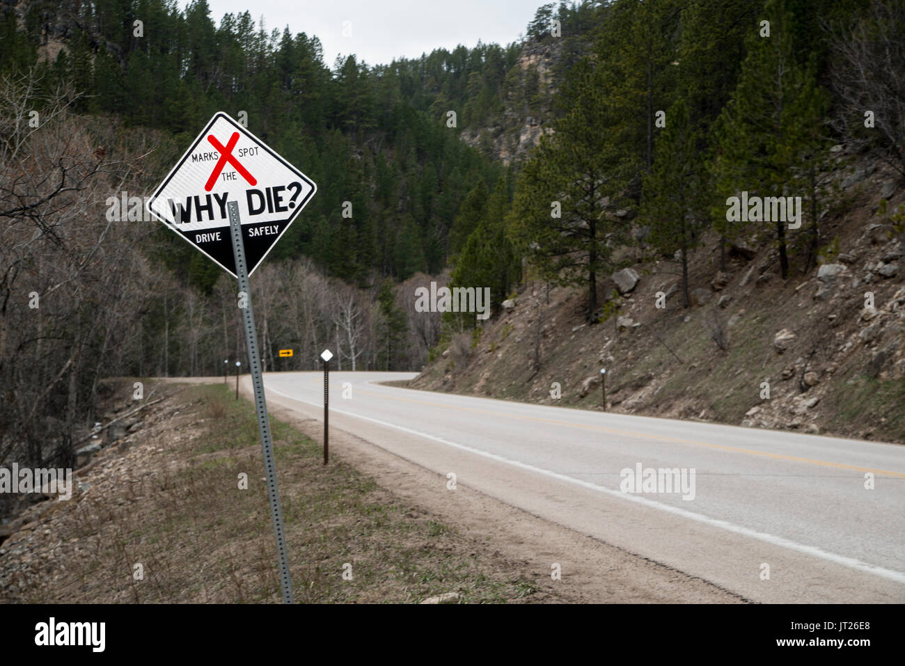 South Dakota. Spearfish Canyon. Why die highway sign to warn drivers to drive safely. Stock Photo