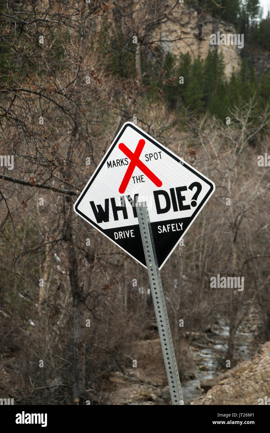 South Dakota. Spearfish Canyon. Why die highway sign to warn drivers to drive safely. Stock Photo