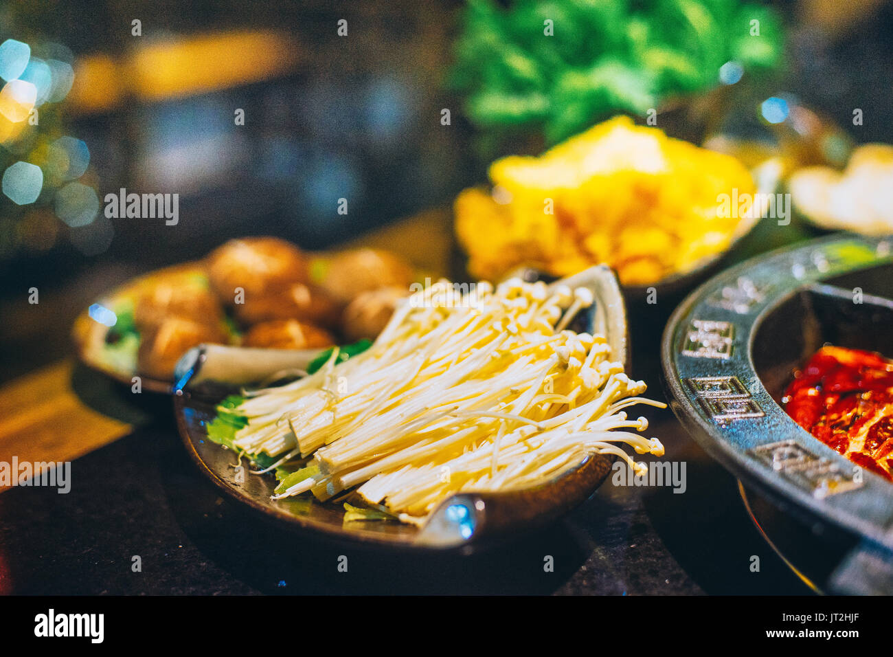 chinese hotpot in two soup, spicy and non spicy Stock Photo - Alamy