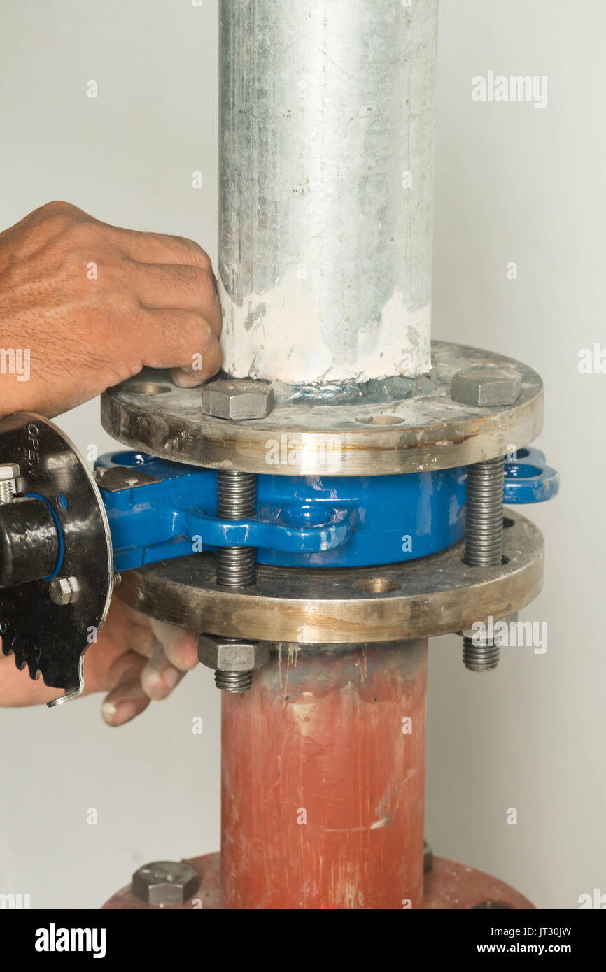 Install high pressure water hose in indrustry Stock Photo Alamy