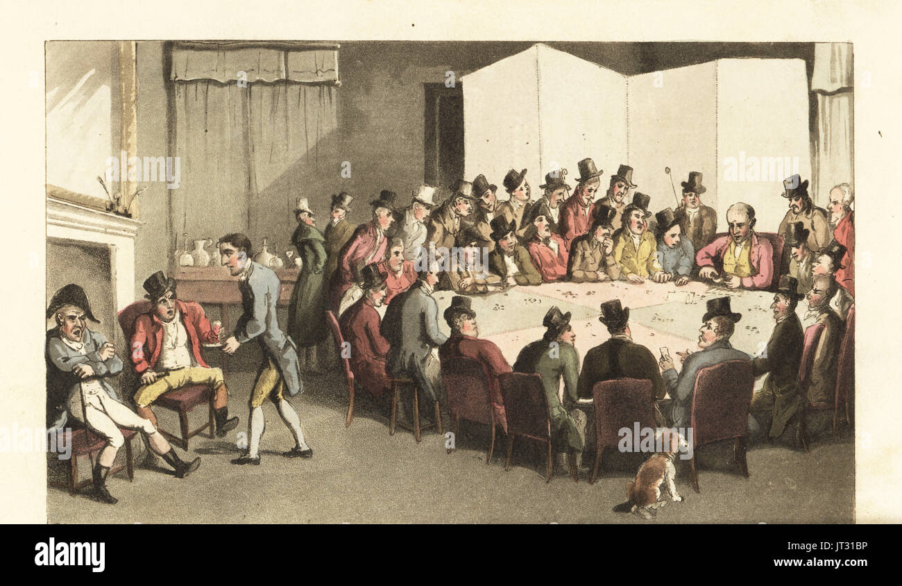 Johnny in service at a gentleman's club, serving wine to members while others gamble on card games at a large gaming table. Handcoloured copperplate engraving by Thomas Rowlandson from William Combe's The History of Johnny Quae Genus, the Little Foundling of the late Doctor Syntax, Ackermann, London, 1822. Stock Photo
