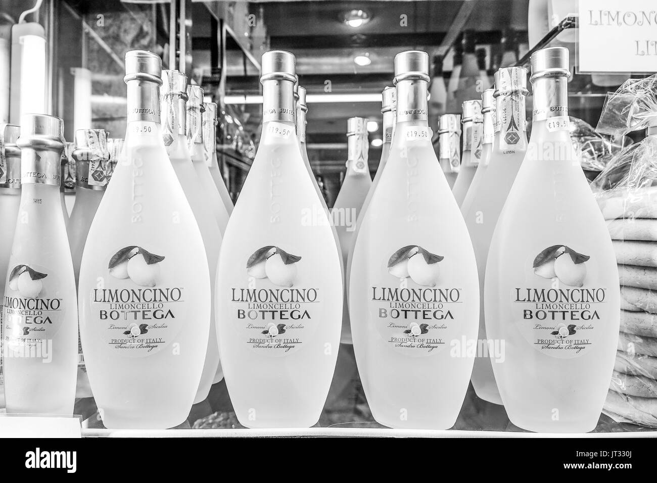 Famous Italian Limoncello bottles - VENICE, ITALY - JUNE 29, 2016 Stock