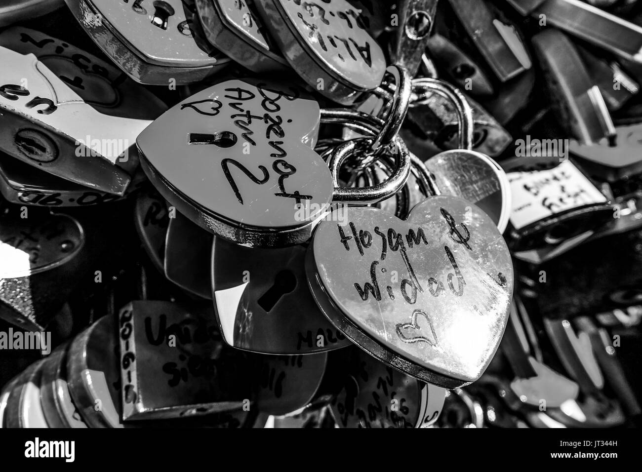 Thousands of locks attachted to the wall of Juliets house in Verona as