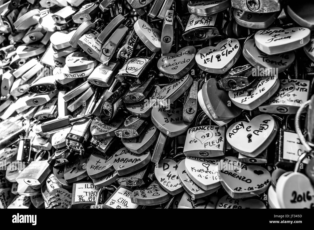 Thousands of locks attachted to the wall of Juliets house in Verona as