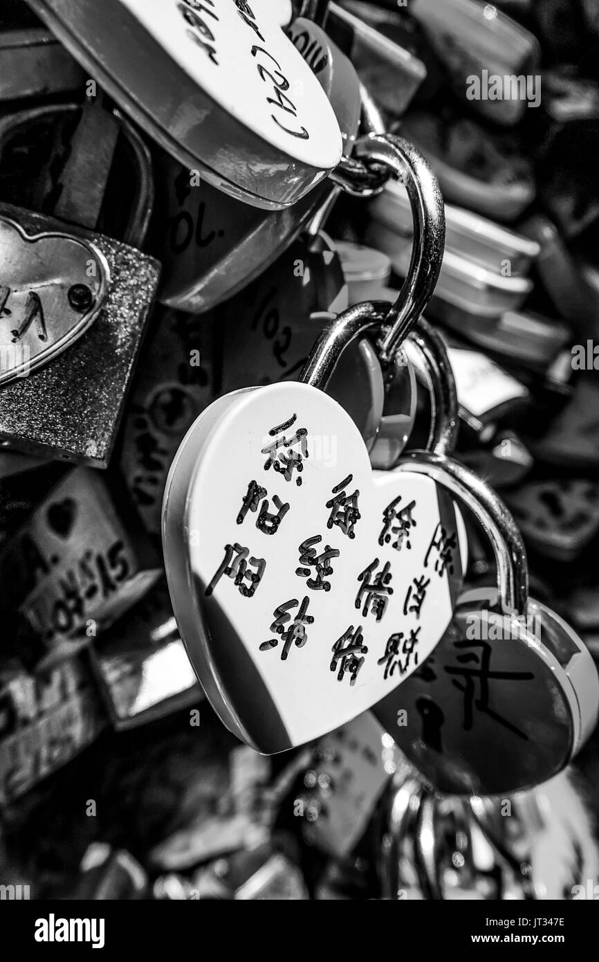 Locks attachted to the wall of Juliets house in Verona as a proof of