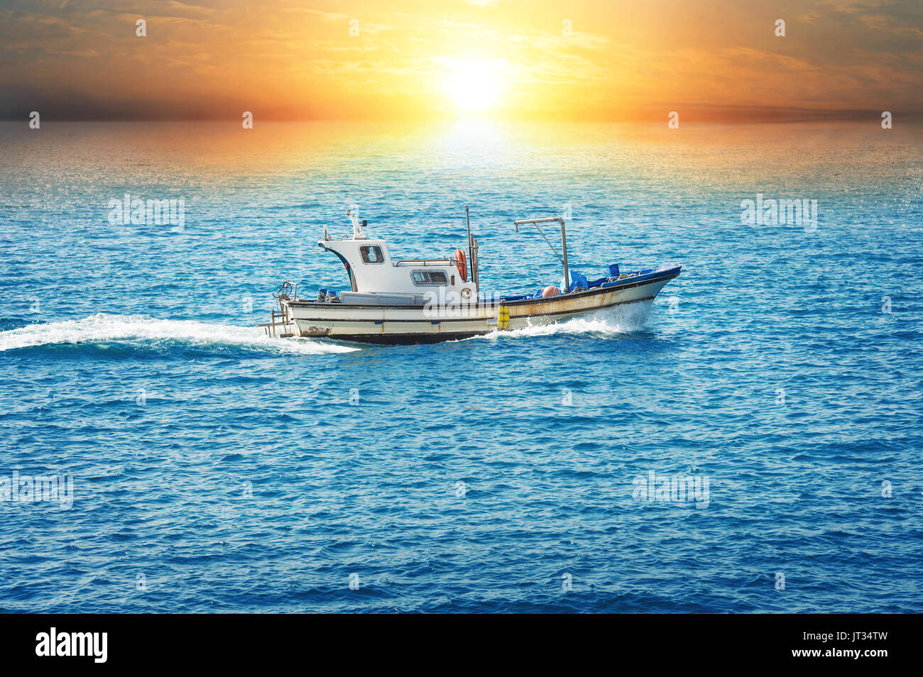 Small trawler sunset hi-res stock photography and images - Alamy