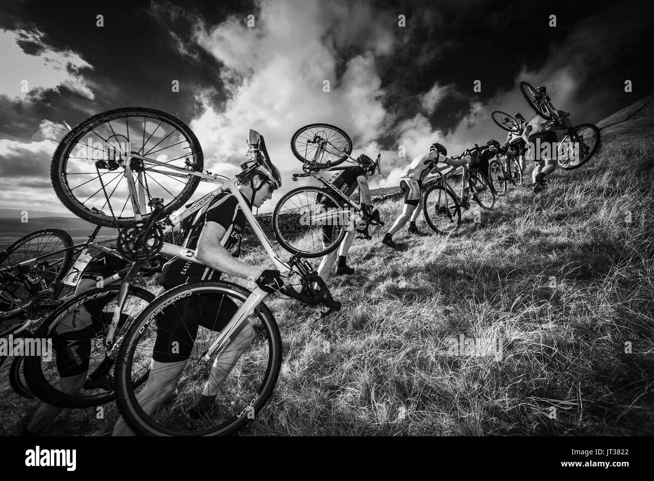 Cyclists uphill Black and White Stock Photos & Images - Alamy