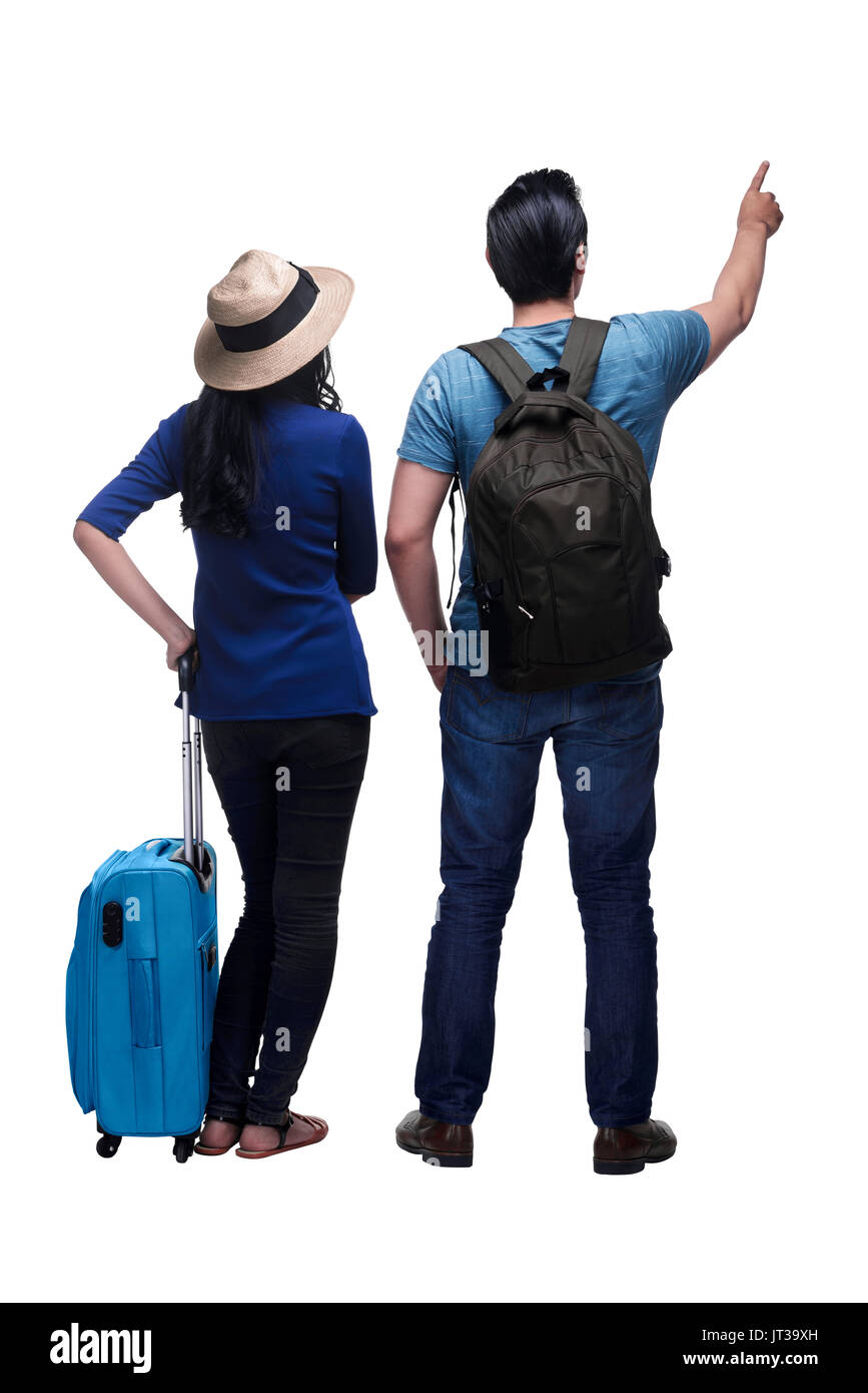 Back view of asian couple traveling together with baggage isolated over white background Stock Photo