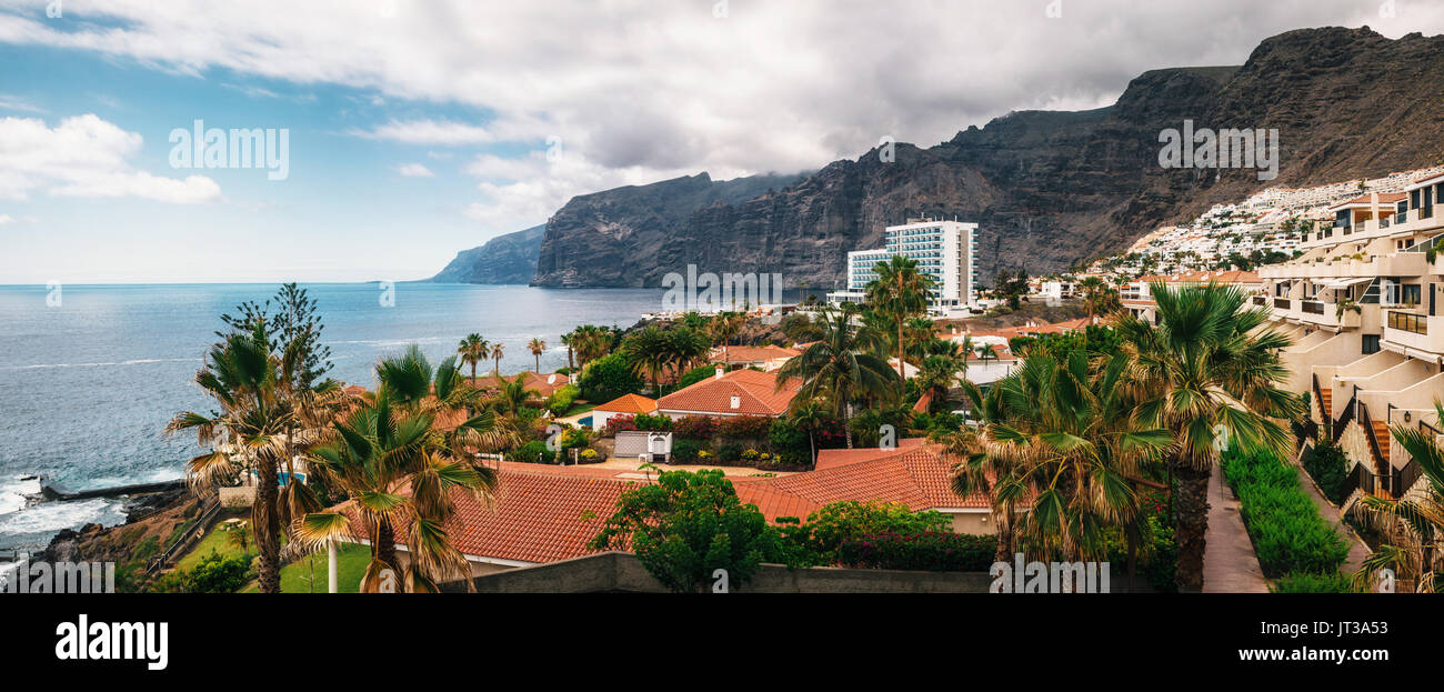 Panoramic aerial view of the Los Gigantes cliffs on Tenerife. The picturesque and serene resort. Canary islands, Spain. Stock Photo