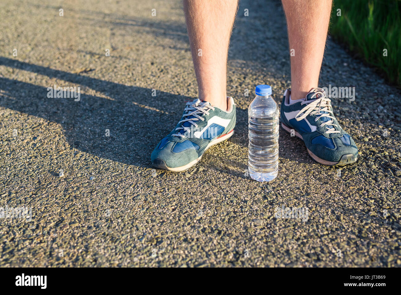 Feet of jogging man Stock Photo Alamy