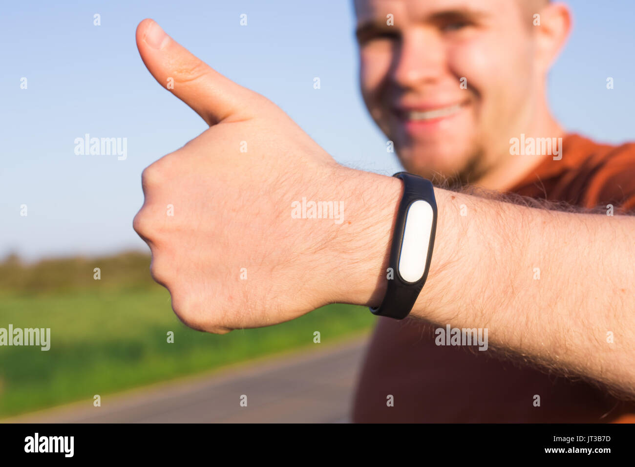 Activity tracker on a man's wrist Stock Photo Alamy
