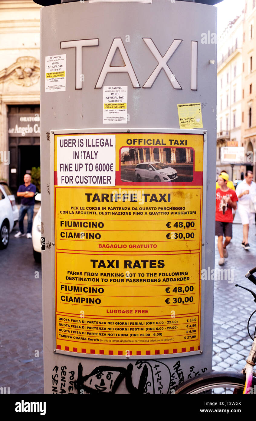 Rome Italy July 2017 - Taxi tariffe prices tarif in Rome with sign saying Uber taxis are illegal in Italy Stock Photo